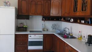 A kitchen or kitchenette at Aphrodite's House