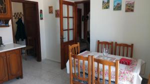A bed or beds in a room at Aphrodite's House