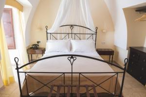 Albergo Diffuso Sotto le Cummerse客房内的一张或多张床位