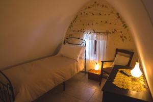 Albergo Diffuso Sotto le Cummerse客房内的一张或多张床位
