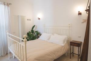 Albergo Diffuso Sotto le Cummerse客房内的一张或多张床位