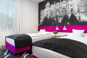 Posteľ alebo postele v izbe v ubytovaní Best Western Plus Krakow Old Town