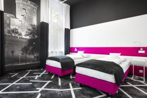 Posteľ alebo postele v izbe v ubytovaní Best Western Plus Krakow Old Town