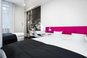 Posteľ alebo postele v izbe v ubytovaní Best Western Plus Krakow Old Town