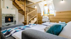 Łóżko lub łóżka w pokoju w obiekcie Rent like home - Sywarne II