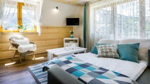 Łóżko lub łóżka w pokoju w obiekcie Rent like home - Sywarne II
