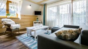 Telewizja i/lub zestaw kina domowego w obiekcie Rent like home - Sywarne II