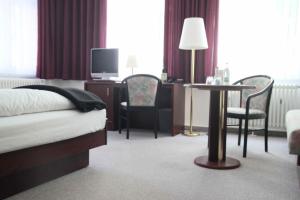 Vuode tai vuoteita majoituspaikassa Stadt-Gut-Hotels - Das Kleine Hotel
