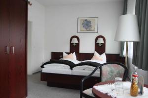 Vuode tai vuoteita majoituspaikassa Stadt-Gut-Hotels - Das Kleine Hotel