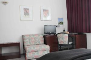 TV tai viihdekeskus majoituspaikassa Stadt-Gut-Hotels - Das Kleine Hotel