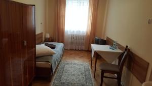 Posteľ alebo postele v izbe v ubytovaní Stary Dom Zdrojowy