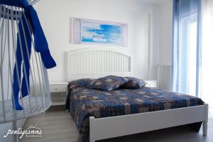 A bed or beds in a room at Il Pentagramma Még 17 kép