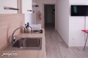 A kitchen or kitchenette at Il Pentagramma