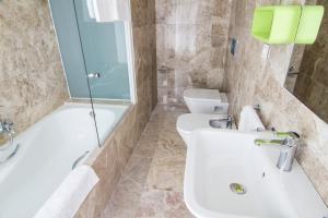 חדר רחצה ב-Hotel Senderos