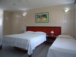 Postel nebo postele na pokoji v ubytování Hotel Nitana