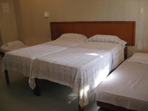 Postel nebo postele na pokoji v ubytování Hotel Nitana