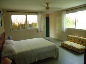 מיטה או מיטות בחדר ב-Hotel Nitana