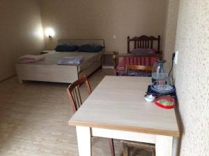 Postel nebo postele na pokoji v ubytování Guest House Econom