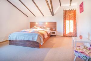 Ein Bett oder Betten in einem Zimmer der Unterkunft Black Queen Guesthouse