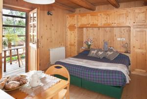 Llit o llits en una habitació de Albergo Diffuso Sauris in Sauris Di Sopra