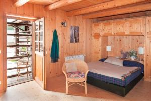Llit o llits en una habitació de Albergo Diffuso Sauris in Sauris Di Sopra