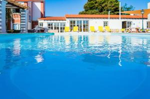 A piscina localizada em Casa Da Padeira - Turismo Rural ou nos arredores