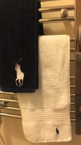 a towel hanging on a towel rack in a bathroom at The View, 22 School Park in Kingsbarns