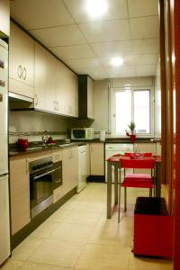 Kuchyň nebo kuchyňský kout v ubytování Apartamento Can Xavi