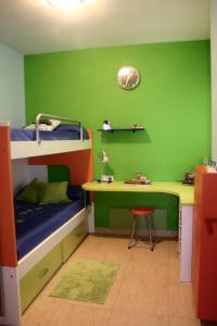 เตียงในห้องที่ Apartamento Can Xavi