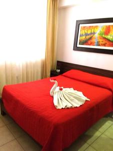 Postel nebo postele na pokoji v ubytování Hotel Kallma