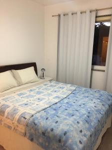 Cama o camas de una habitación en Casa na Praia Barra da Tijuca