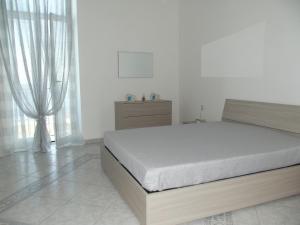 Postel nebo postele na pokoji v ubytování B&B del Mare