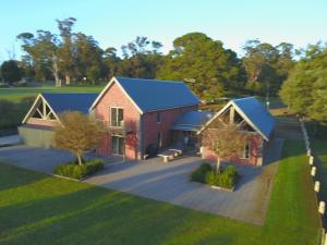 an aerial view of a house with blue roofs at Paradiso Kinglake in Kings Lake East