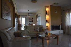 Posezení v ubytování Marilias house