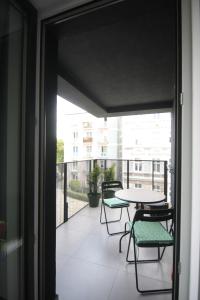 Balkón alebo terasa v ubytovaní AL-DOM apartamenty Kniewskiego 11 Kolobrzeg