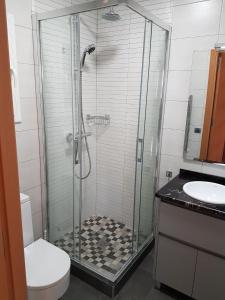 Kylpyhuone majoituspaikassa Salions Apartment