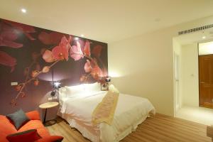 Llit o llits en una habitació de 大鵬灣瞭望台 Top Bay B&B