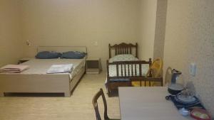 Postel nebo postele na pokoji v ubytování Guest House Econom