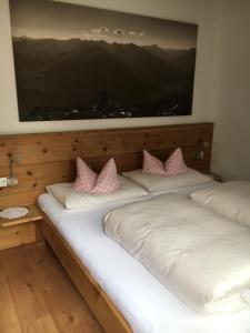 Postel nebo postele na pokoji v ubytování Haus Schuchter