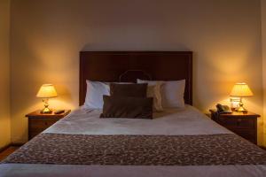 Un pat sau paturi într-o cameră la El Cano