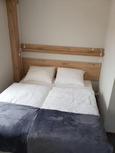 Łóżko lub łóżka w pokoju w obiekcie Villa Nina