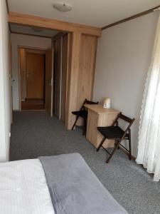 Łóżko lub łóżka w pokoju w obiekcie Villa Nina