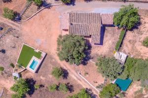 an overhead view of a house with a pool at Villa Calvià countryside in Calvià