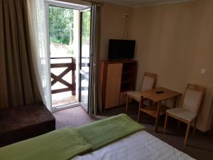 Telewizja i/lub zestaw kina domowego w obiekcie Villa Nina