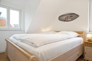 Ein Bett oder Betten in einem Zimmer der Unterkunft Fennenblick