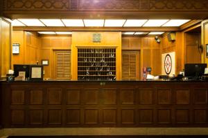 a bar with a bunch of bottles of wine at Missouri Athletic Club in Saint Louis