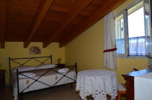 Postel nebo postele na pokoji v ubytování Ansise Guest House