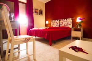 A bed or beds in a room at B&B Tifeo