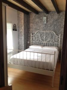Postel nebo postele na pokoji v ubytování Casa Soleta Ezcaray