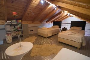 Postel nebo postele na pokoji v ubytování Odysseos St. Loft